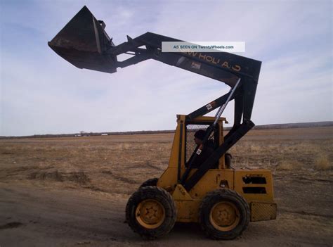 l553 skid steer specs|l553 skid steer oil capacity.